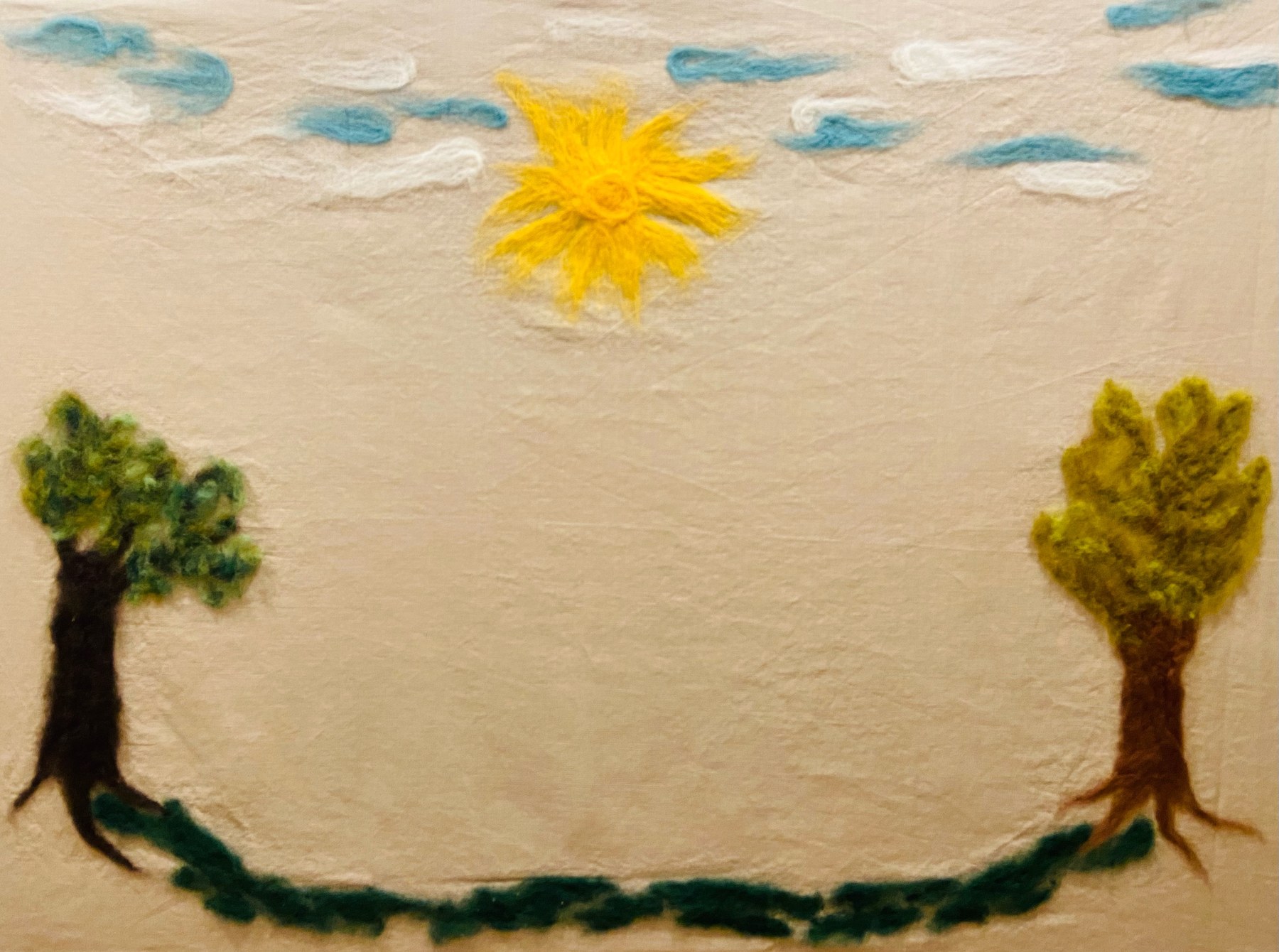 Hand-felted wool artwork made at the Playgarden